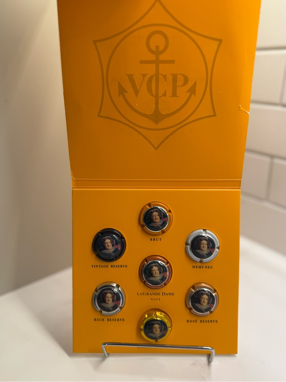 Veuve Clicquot Champagne Capsule Display Set
7 Caps • La Grande Dame • France